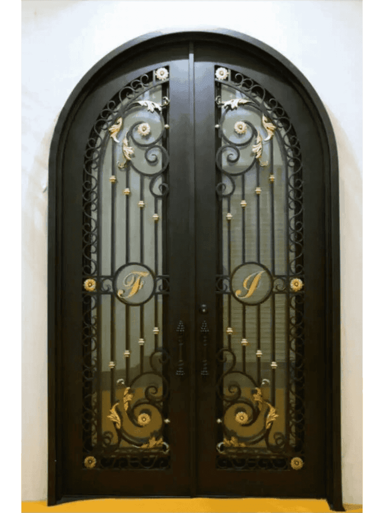 Ornate arched wrought iron door EL1163 MCD with scrollwork, rosettes, and embossed panels, hand-forged for secure artistry.