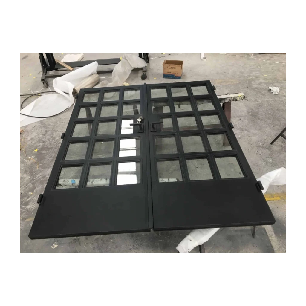 Modern double wrought iron door EL1192 MCD with double panels, crafted for contemporary architecture.