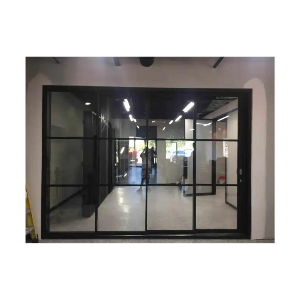 The EL1024 MCD wrought iron double door showcases grid glass panels, offering modern elegance, durability, and secure craftsmanship.