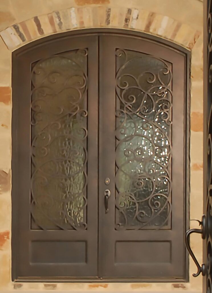 EL2085 MCD arched double wrought iron door with vine scrollwork and insulated glass panels