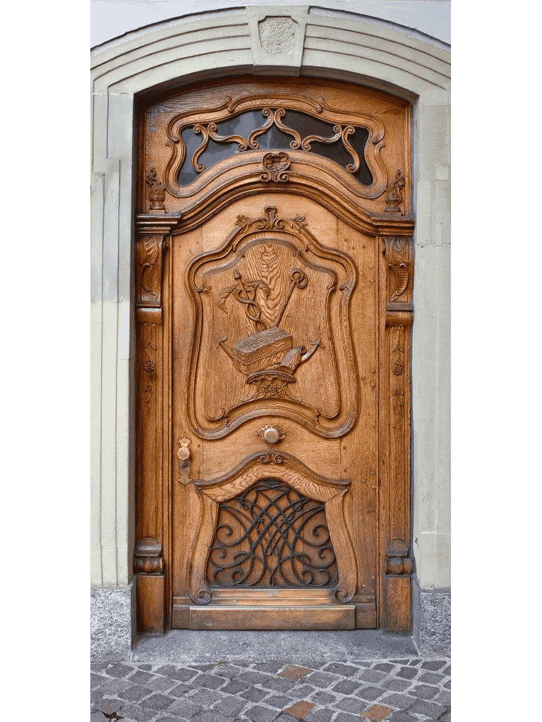 ornate arched hand-carved wood door with iron detail HCD2029 MCD