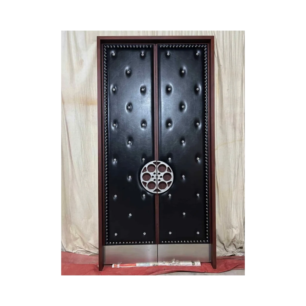 Black tufted home theater door with silver film reel accent and studded trim – HT3024 MCD
