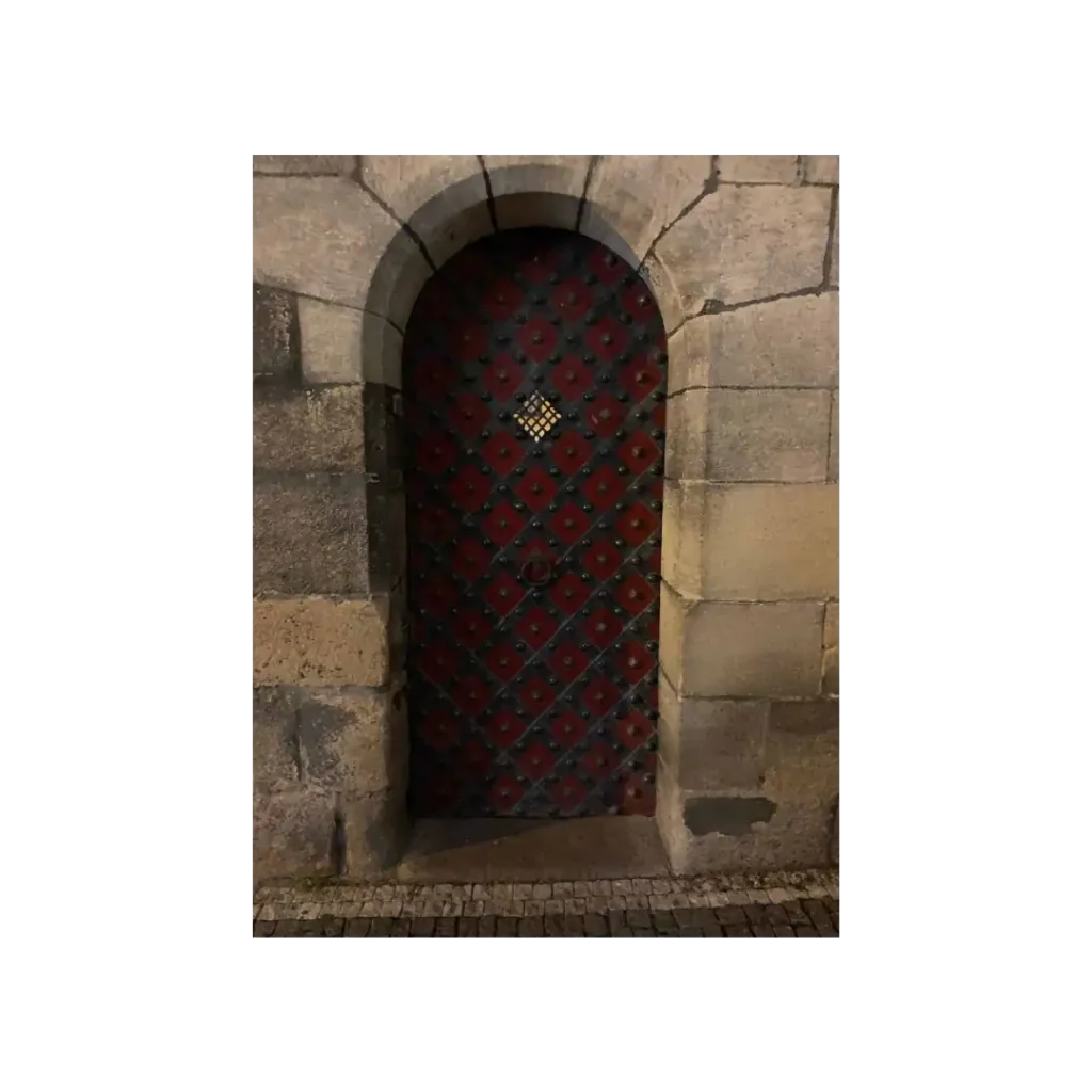 Single wrought iron door EL1014 MCD with rustic red diamond pattern, handcrafted for durability and traditional charm.