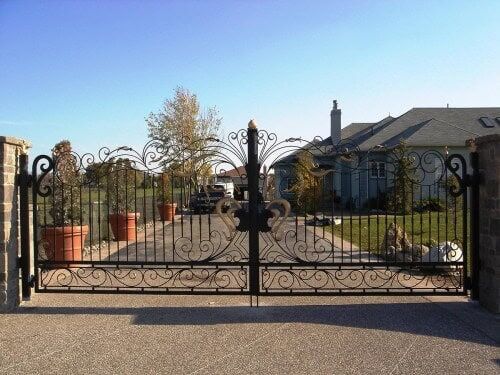 Elegant wrought iron gate with decorative scrollwork and luxury estate driveway design G121 MCD