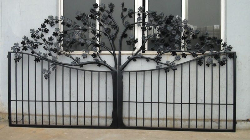 Artistic wrought iron gate with handcrafted tree silhouette and decorative branch detailing G117 MCD