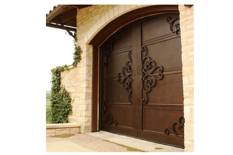 Spanish style wrought iron garage door GD4008 MCD with decorative scrollwork and arched design by Monarch Custom Doors