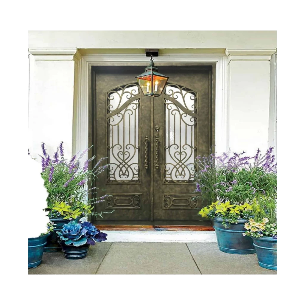 Double wrought iron door with textured glass, symmetrical scrollwork and solid lower panels EL1096 MCD handcrafted by Monarch Custom Doors.
