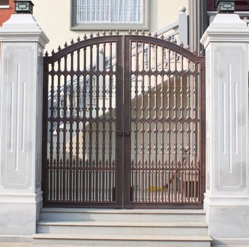 Traditional wrought iron gate with spear top finials and arched vertical baluster design G118 MCD