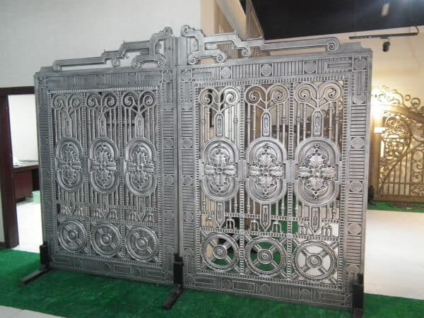 Decorative wrought iron gate with regal medallion detailing and geometric iron patterns G105 MCD