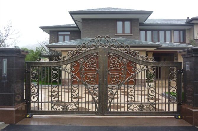 Contemporary wrought iron gate with elegant scrollwork and decorative center accents G109 MCD