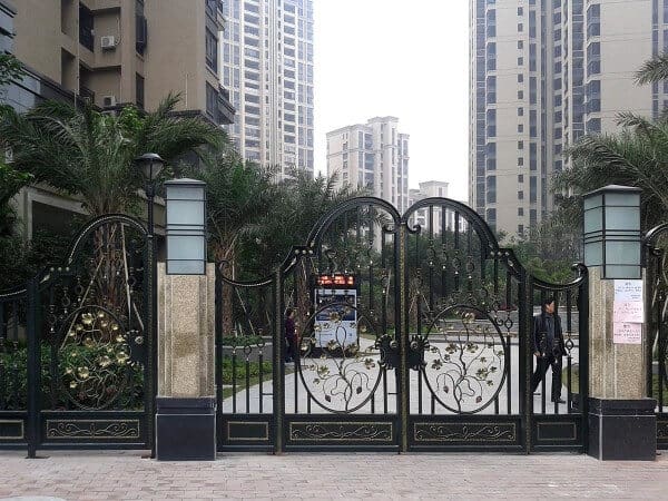Elegant wrought iron gate with arched framing and decorative scroll detailing G132 MCD
