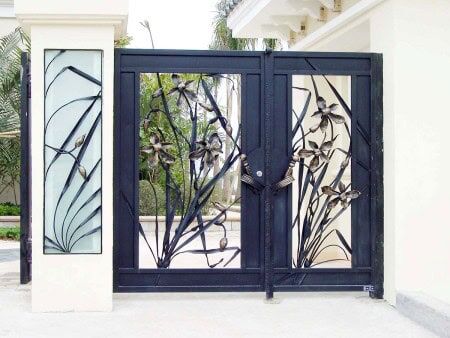 Artistic wrought iron gate with floral branch and botanical iron detailing G131 MCD