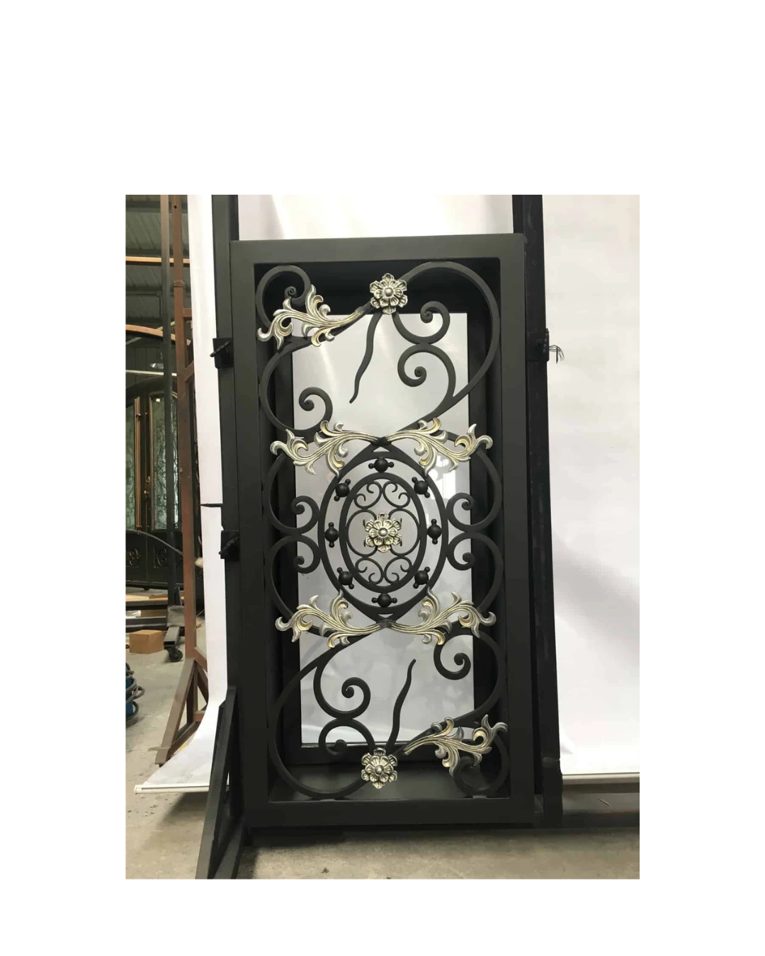 Wrought iron window with gold accent scrollwork LW153 MCD Monarch Custom Doors