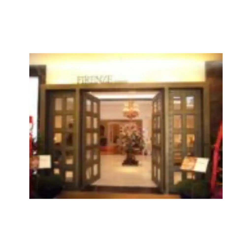 Double wrought iron door EL1038 MCD with full glass panels and ornate framing, handcrafted for elegance and strength.