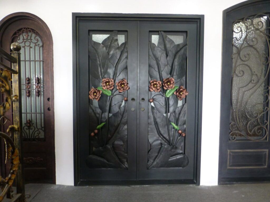 Artistic wrought iron door EL1137 MCD with custom forged floral motifs, handcrafted for unique luxury strength.