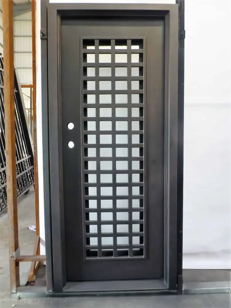 Single wrought iron door EL1026 MCD with grid-style design and glass inserts, handcrafted for strength and style.