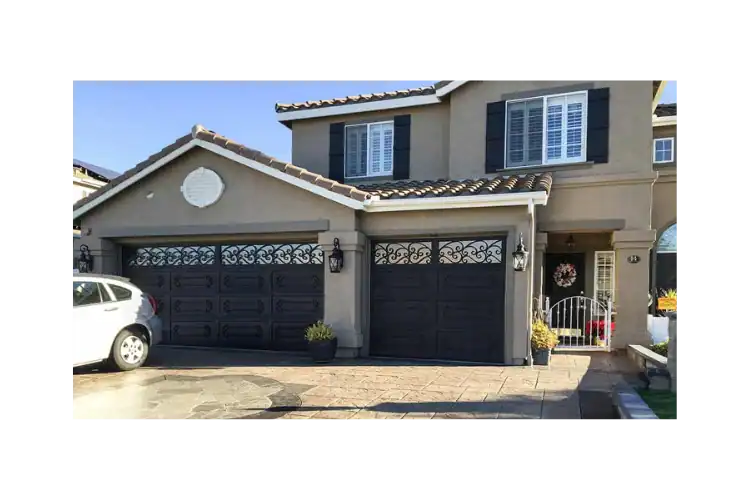 san clemente scrolling wrought iron garage door GD4016 MCD with decorative iron scrollwork and glass panels by Monarch Custom Doors