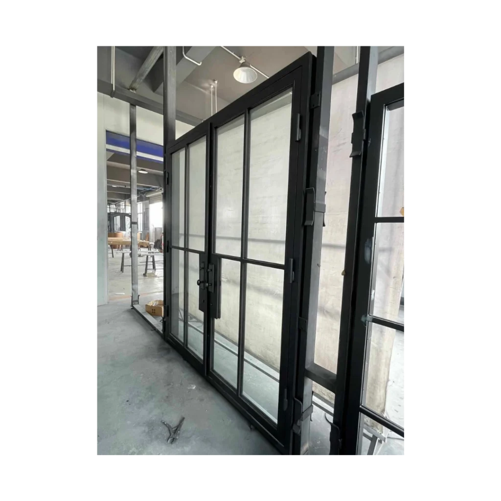 EL1459 MCD industrial steel pivot door with large glass panels and modern framing